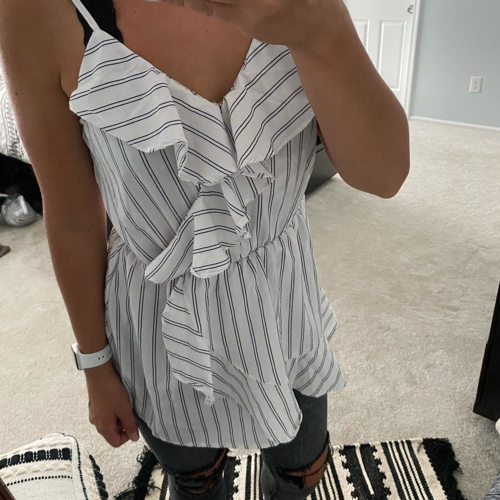 Perfect for summer, sleeveless dressy shirt